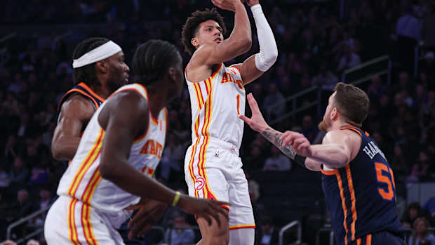 Mar 5, 2024; New York, New York, USA; Atlanta Hawks forward Jalen Johnson (1) shoots the ball as New York Knicks center Isaiah Hartenstein (55) defends during the first quarter at Madison Square Garden. Mandatory Credit: Vincent Carchietta-USA TODAY Sports